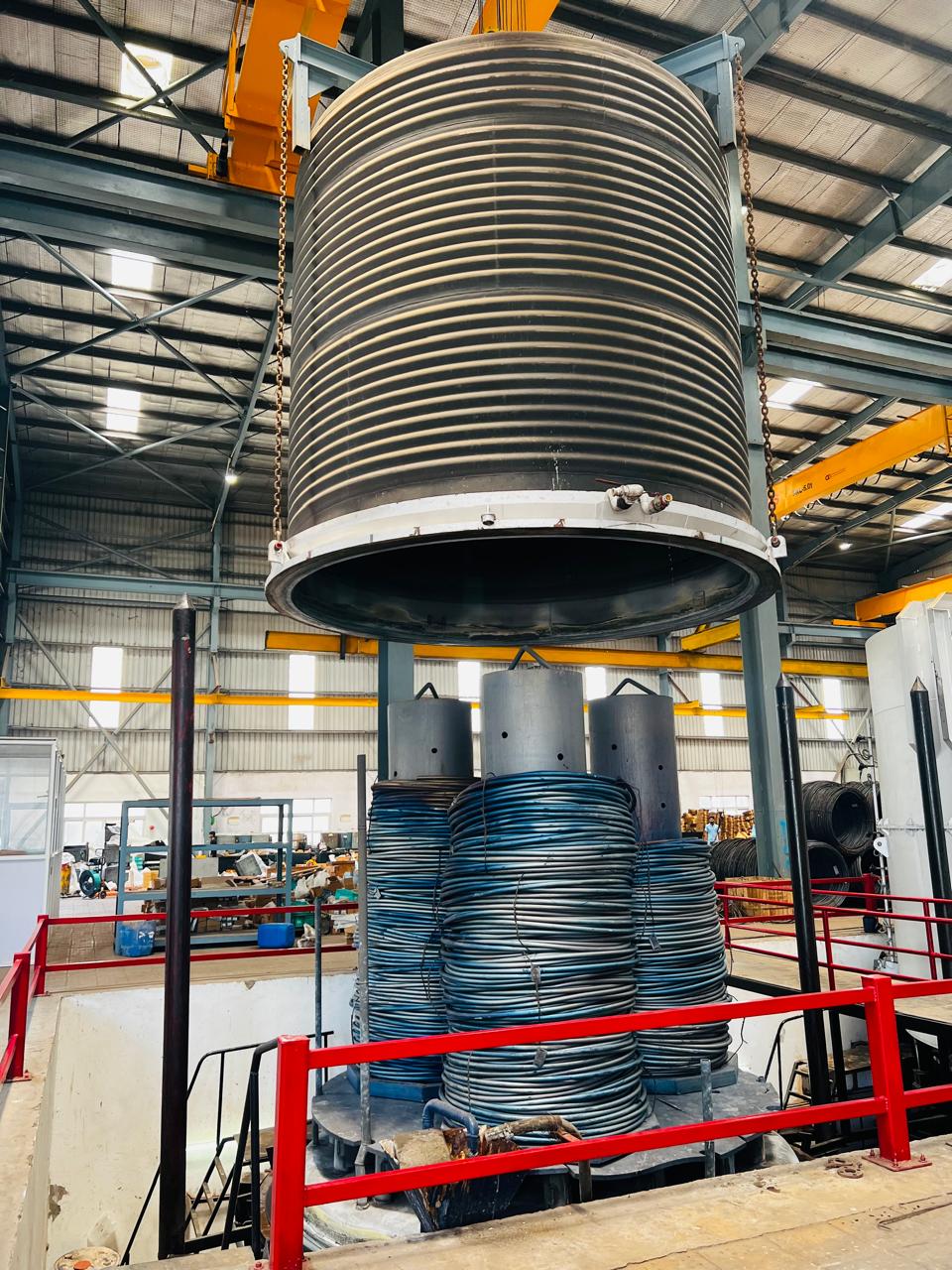 Bell type annealing furnace being loaded over wire coils