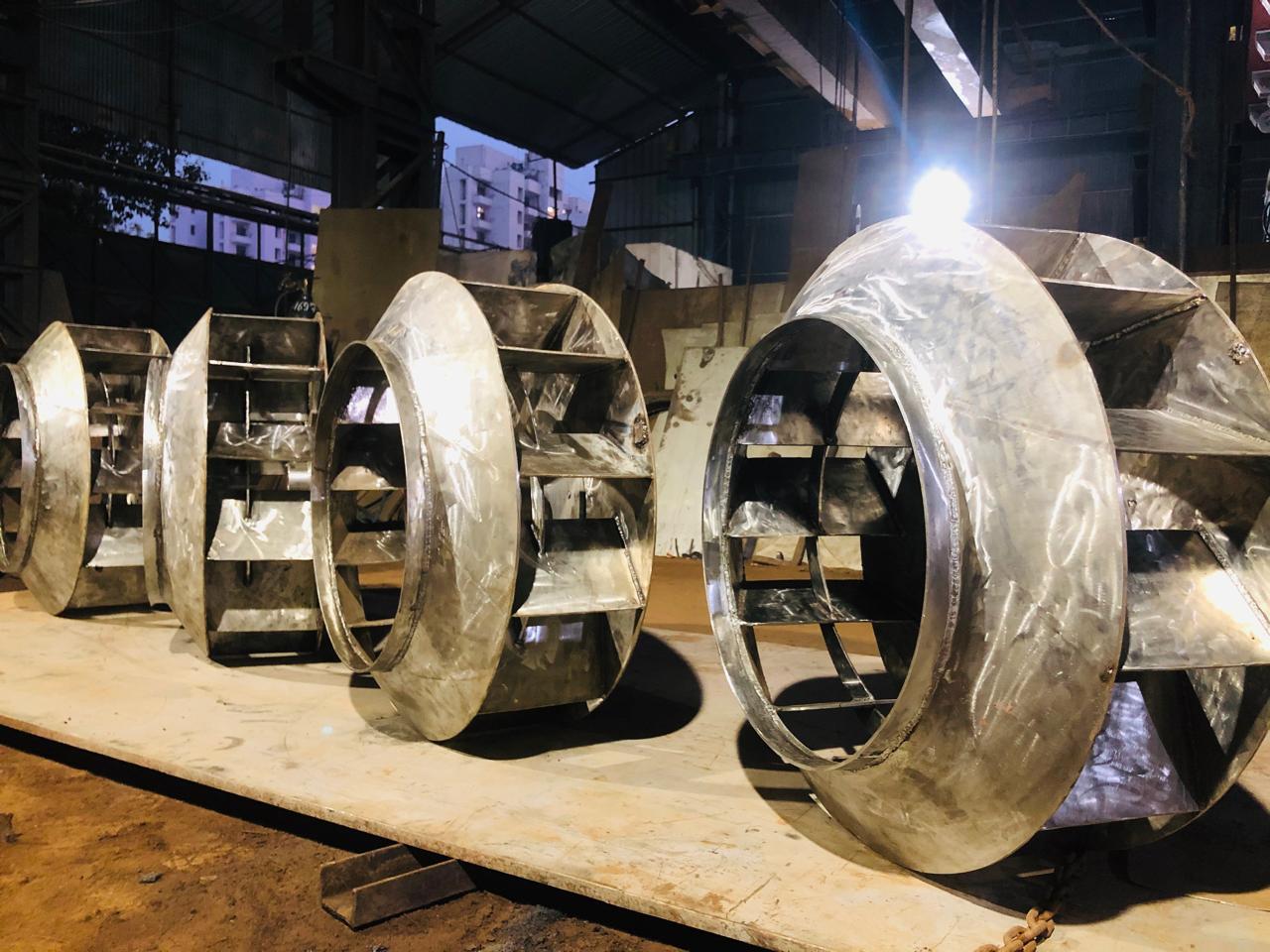 Row of fabricated impellers